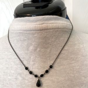 Dainty black stones with silver chain and one black droplets stone